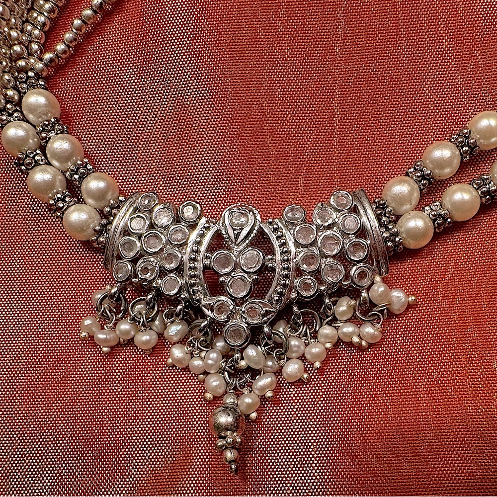 Take the Dazzle up a notch! Faux Pearl & Silver Adjustable Length Necklace.
